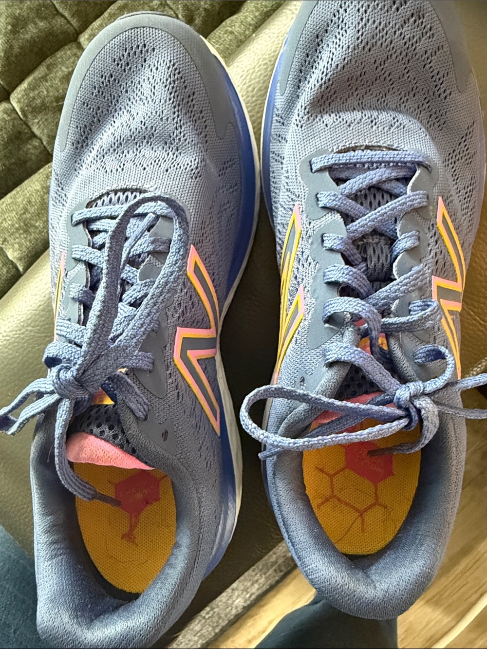 New Balance Blue Athletic Shoes with Pink and Yellow Accents
